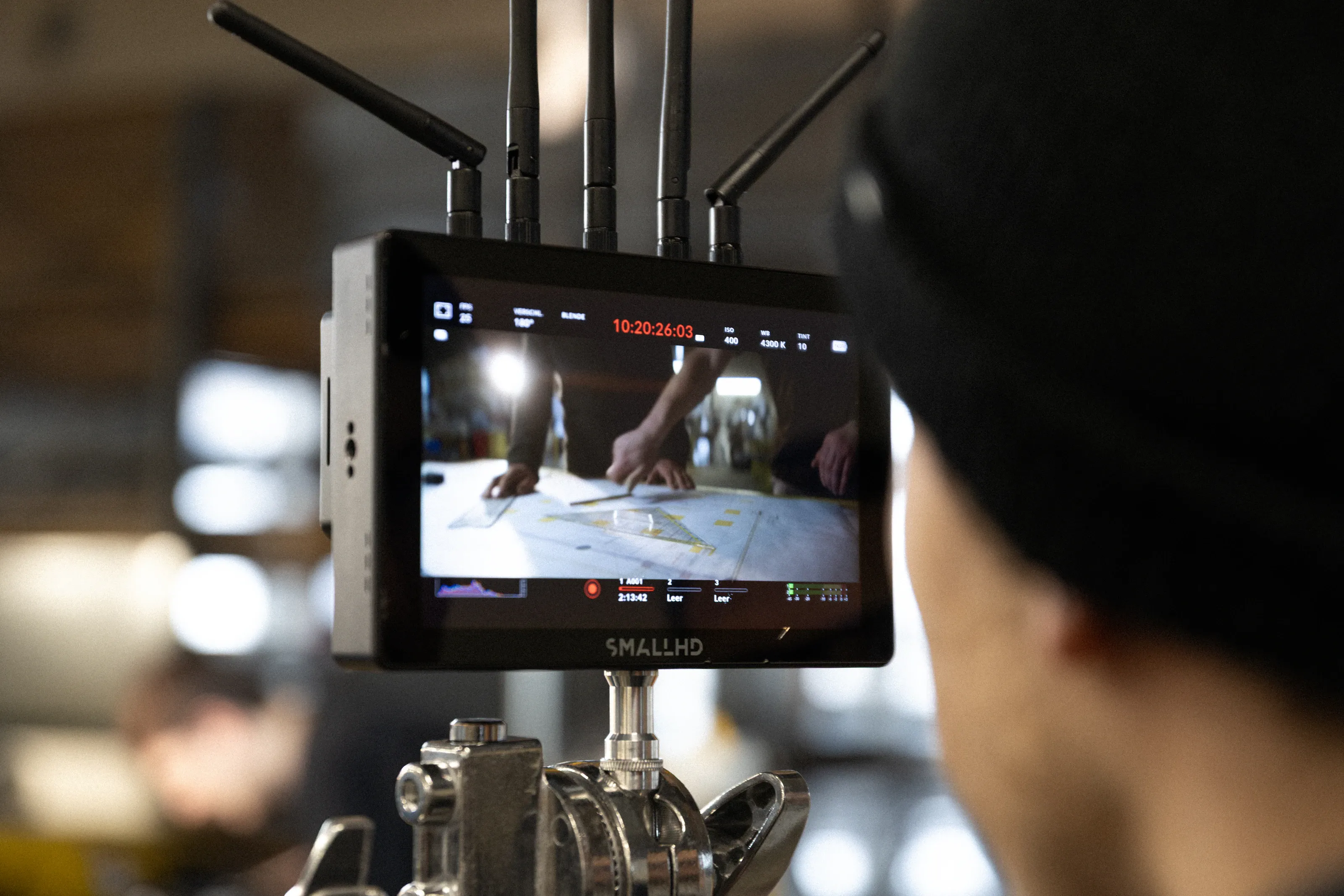 Production monitor on set showing a planned shot